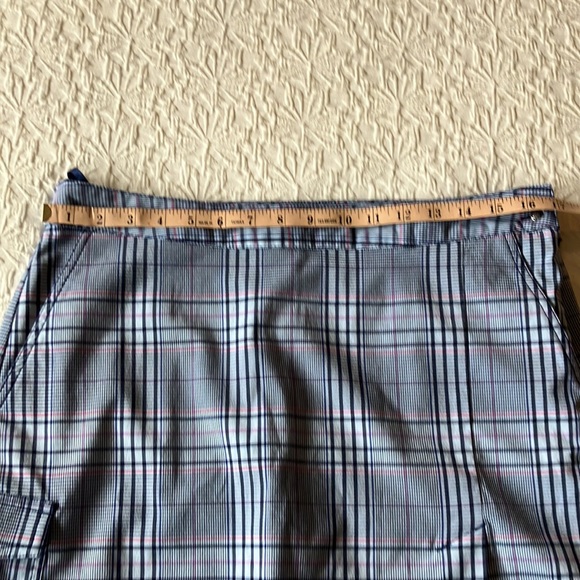 Plaid skort in blue black purple white and red with navy stretch shorts attached - Picture 12 of 13